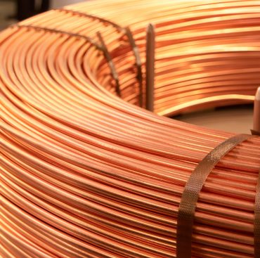 Bended fat curved copper cables. Electrical conductor.